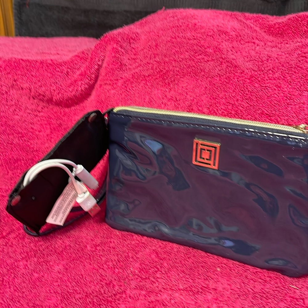 LIZ CLAIBORNE Wristlet Wallet. 4 Card slots. Blue Patent. Power bank included
